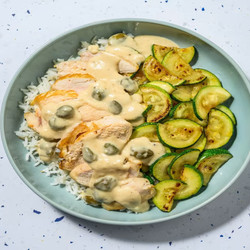 Pan-seared Turkey And Caper Cream  With Garlic Butter Rice And Zucchini