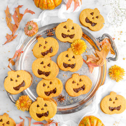 Pumpkin Butter Filled Jack O&apos;lantern Sandwich Cookies