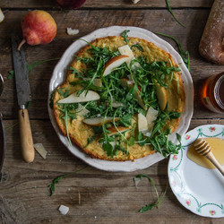 Farinata With Arugula, Pear, Honey, And Pecorino