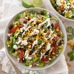 Mexican Street Corn Salad With Black Beans, Radish, Feta &amp; Lime Crema