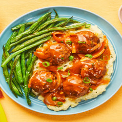 Gravy-smothered Meatballs Over Thyme Mashed Potatoes With Roasted Green Beans