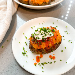 Twice Baked Buffalo Chicken Potatoes