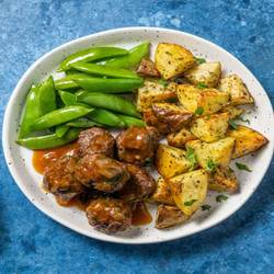 Turkey Meatballs And Savoury Thyme Gravy With Roasted Potatoes And Sugar Snap Peas