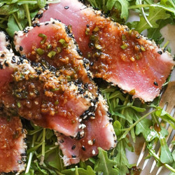 Sesame Crusted Tuna Steak On Arugula