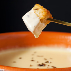 Aged Gouda Fondue With Caraway Croutons