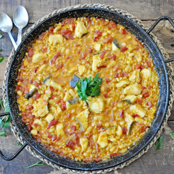 Spanish ¨Arroz Empedrado¨ Rice With White Beans And Cod