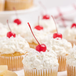 Pina Colada Cupcakes With Coconut Whipped Cream