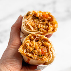 Cheesy Ground Chicken And Rice Burritos