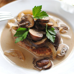 Pork Chops And Mushrooms In A White Wine Sauce