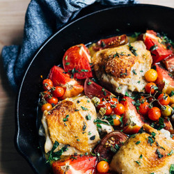 Baked Chicken Thighs With Tomatoes And Garlic