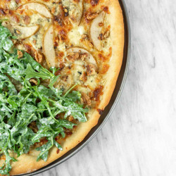Caramelized Onion, Gorgonzola And Pear Pizza With Arugula