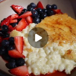 Homemade Vanilla Bean Tapioca Pudding With Brûléed Top And Macerated Berries