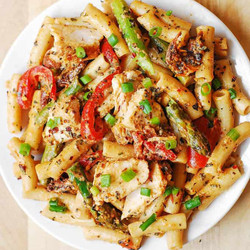 Creamy Chicken And Vegetable Pasta With Bell Peppers, Asparagus, And Sun-dried Tomatoes