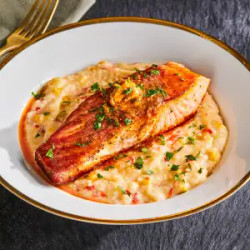 Salmon With Old Bay Butter And Confetti Grits