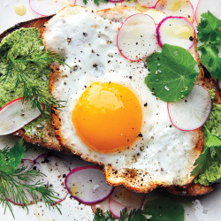 Fried Egg On Toast With Salted Herb Butter And Radishes