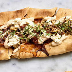 Chicken And Garlic Köfte Pide With Chilli Yoghurt, Smoked Salsa, Walnuts And Feta
