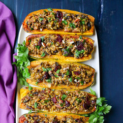 Wild Rice & Lentil Stuffed Delicata Squash With Cranberries & Pecans