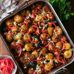 Tyler Florence’s Campfire Potatoes With Tomatoes, Bacon, And Blue Cheese