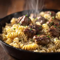 Cajun Steak Tips In Cheesy Rotini Parmesan Sauce