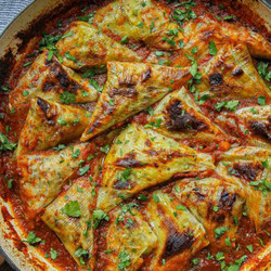 Chickpea &amp; Rice Stuffed Leeks In Aromatic Spiced Tomato Sauce