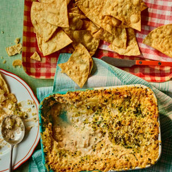 Hot cheesy crab and chive dip ‘n’ chips Georgina Hayden seafood