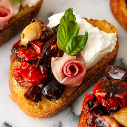 Bruschetta With Burrata, Seared Tomatoes &amp; Roasted Garlic