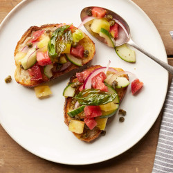 Panzanella Tomato Toast With Crispy Capers And Basil Leaves
