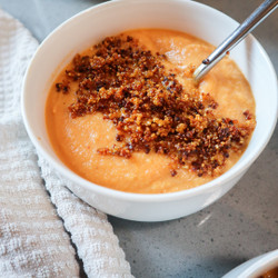 Roasted Garlic, Cauliflower, And Tomato Soup With Crispy Quinoa