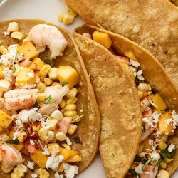 Shrimp Tacos With Mango, Basil, Corn, And Feta