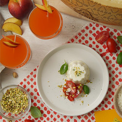 Mini Savoury Grana Padano Panna Cotta With Fresh Plum Tomatoes, Chopped Pistachio And Basil + Bellini Cocktail