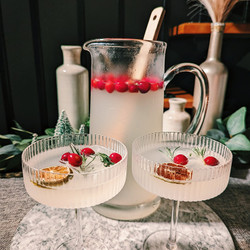 Batched Winter Cosmo: Mrs. Claus's Signature Cocktail