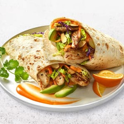 Orange Chicken Tortilla Wrap With Shredded Veggies, Avocado &amp; Sesame Ginger Dressing
