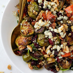 Roasted Brussel Sprouts with fruit, nuts, and cheese