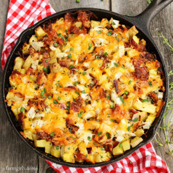 Cheesy Grilled Skillet Potatoes With Bacon And Herbs