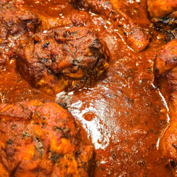 Clara's Oven-Braised Spicy Tomato Chicken Legs