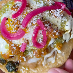 Breakfast Tostadas With Chorizo And Pickled Red Onions