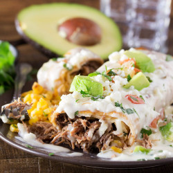 Queso Smothered Beef Chimichangas
