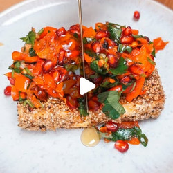 Breaded feta with vegetables and pomegranate