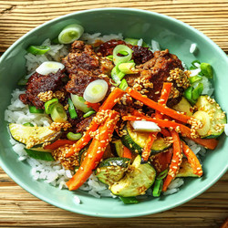 Bibimbap-style Rice Bowls And Spicy Sesame Sauce With Beyond Meat®, Zucchini And Carrots