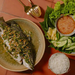 Vietnamese Steamed Whole Fish In Rice Paper And Herbs