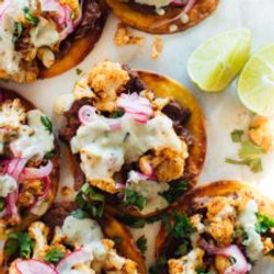 Cauliflower Black Bean Tostadas With Queso And Pickled Onion