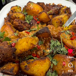 Beef Curry With Spicy Roast Potatoes And Onion Bhajis