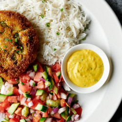 Cod Cake With Amba Sauce And Israeli Salad