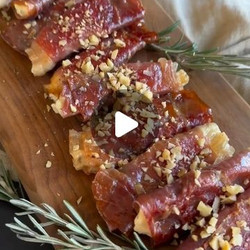 Crispy Prosciutto Wrapped Boursin Cheese With Honey And Chopped Nuts