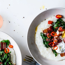 Cheesy Grits With Poached Eggs, Greens, And Bacon