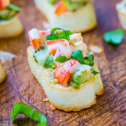 Avocado, Tomato, And Mozzarella Crostini