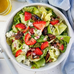Butterhead Lettuce And Strawberry Salad With Blue Cheese And Candied Pecans