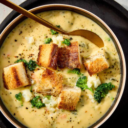 Broccoli, Cauliflower, And Cheddar Soup With Garlic Croutons