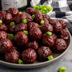 The Best Crockpot Meatballs With Grape Jelly And Chili Sauce