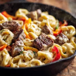 Creamy Cowboy Butter Tortellini With Steak And Carrots And Bell Peppers